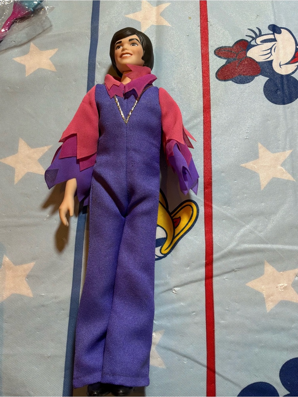 Vintage porcelain Donny Osmond doll has a broken arm
